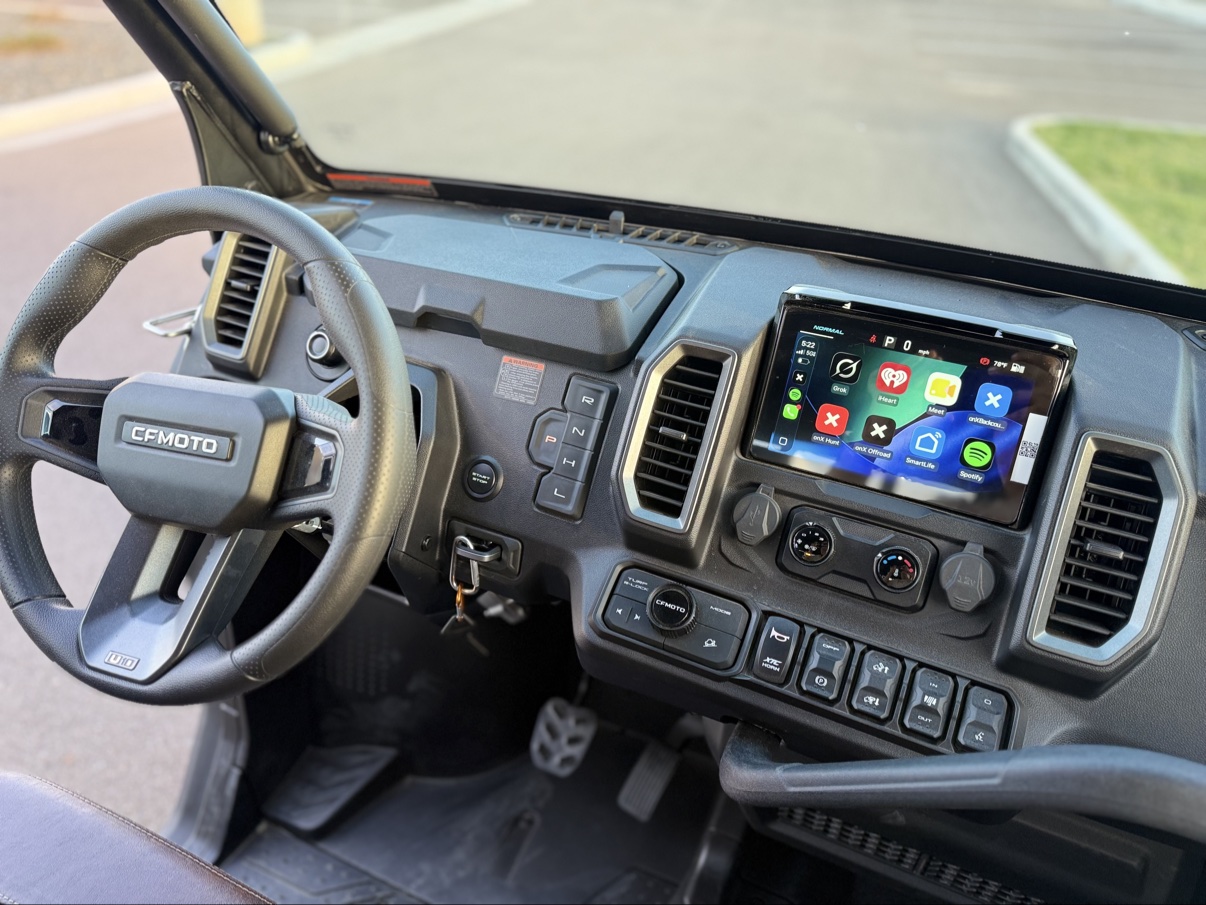 Dashboard with Apple CarPlay and onX Offroad trail maps on the touchscreen